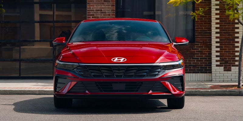 A red 2024 Hyundai Elantra viewed from the front near San Leandro, CA 
